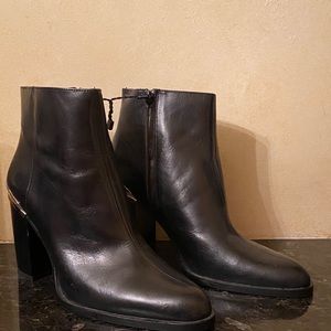 Zara black leather booties.